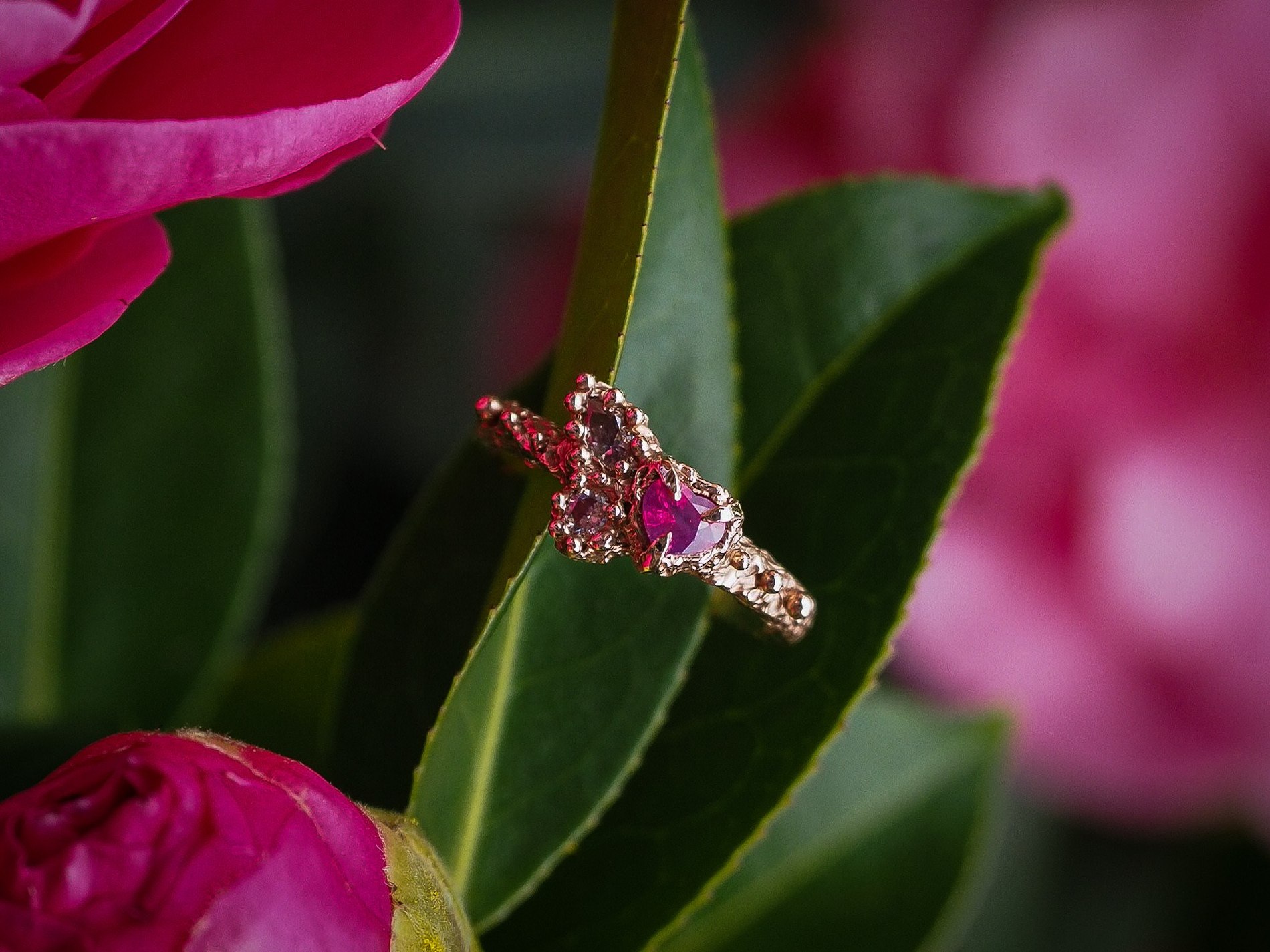 A handcrafted ring set with a heart-shaped sapphire