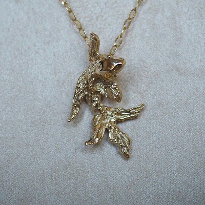 The River pendant, a 9ct yellow gold koi pendant