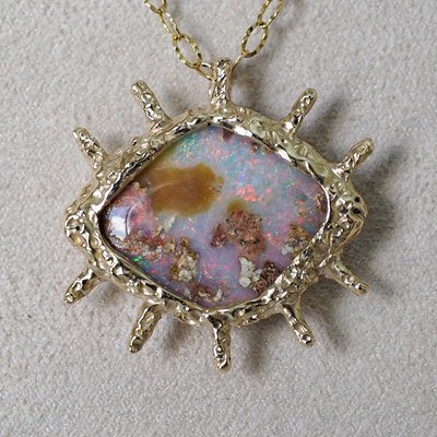 The Oculus pendant, set with a natural Australian opal